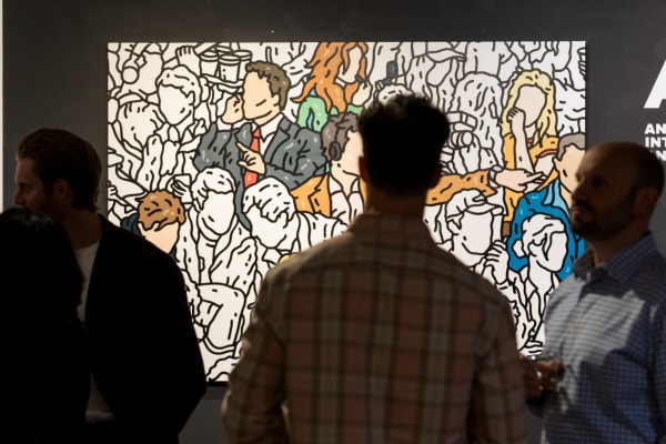 People at a Chicago art event, a solo exhibition for artist Chance Cooper titled "Action!", hosted by Chicago art gallery Carousel Fine Art.