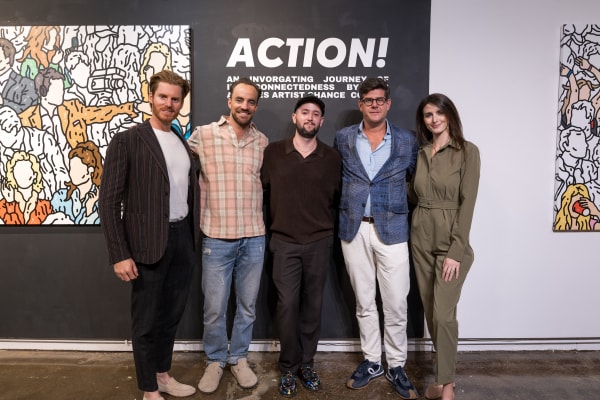 People at a Chicago art event, a solo exhibition for artist Chance Cooper titled "Action!", hosted by Chicago art gallery Carousel Fine Art.