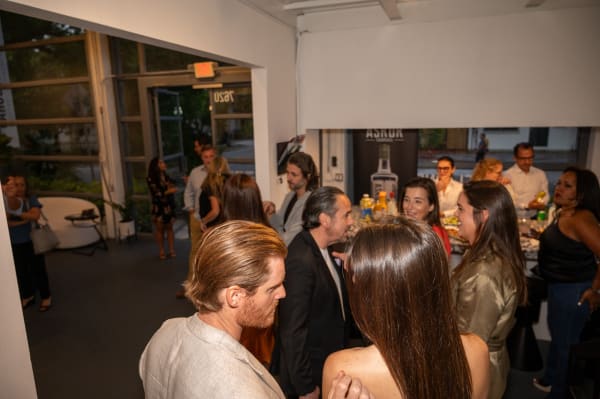 People at Carousel Fine Art's Miami gallery space for the exhibition, "If These Walls Could Talk."