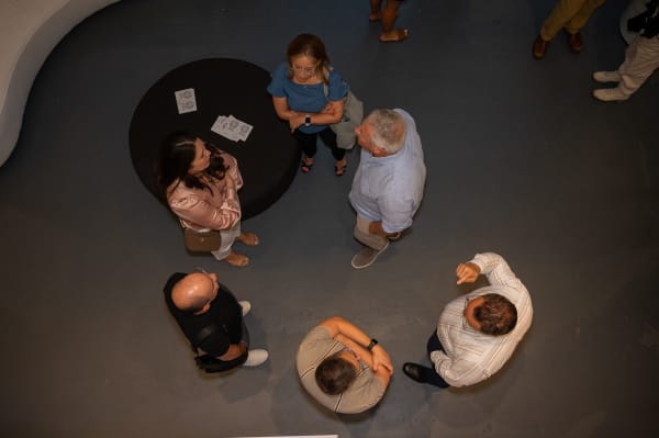 People at Carousel Fine Art's Miami gallery space for the exhibition, "If These Walls Could Talk."