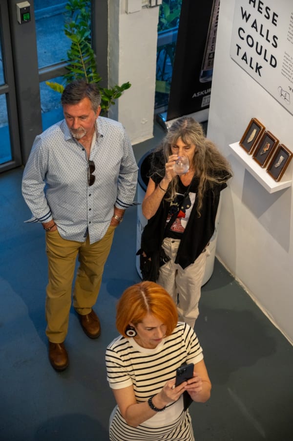 People at Carousel Fine Art's Miami gallery space for the exhibition, "If These Walls Could Talk."