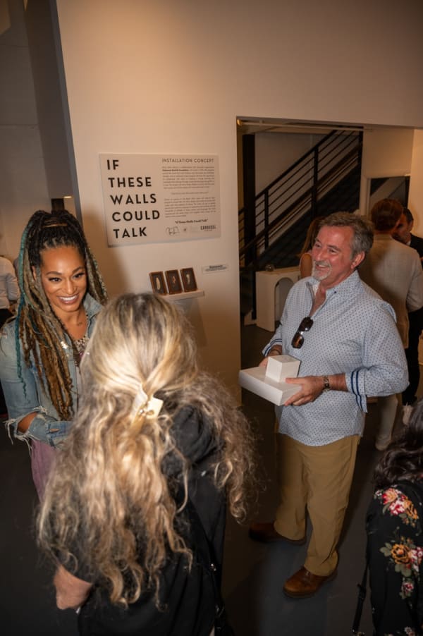 People at Carousel Fine Art's Miami gallery space for the exhibition, "If These Walls Could Talk."
