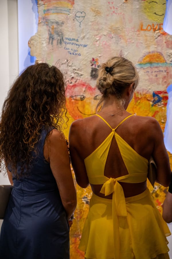 People at Carousel Fine Art's Miami gallery space for the exhibition, "If These Walls Could Talk."
