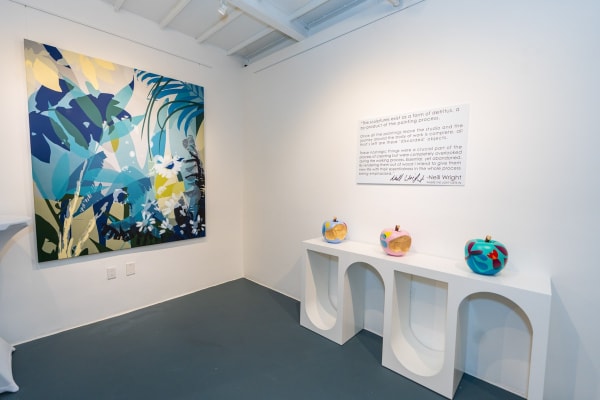Paintings and sculptures by Neill Wright displayed inside Carousel Fine Art's Miami gallery space during Neill Wright's exhibition "Where the Light Gets In."