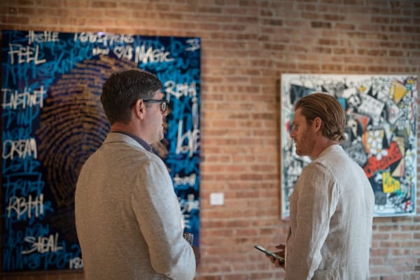 People in Carousel Fine Art's Chicago location during the Chicago Grand Opening.