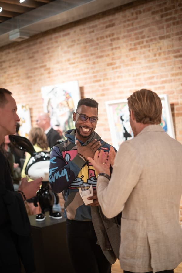 People in Carousel Fine Art's Chicago location during the Chicago Grand Opening.