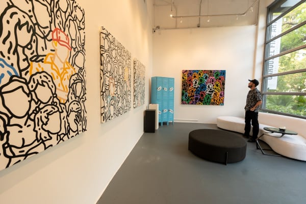 Carousel Fine Art's gallery space in Miami, FL during Chance Cooper's Spotlight Exhibition, "Between Me and You."