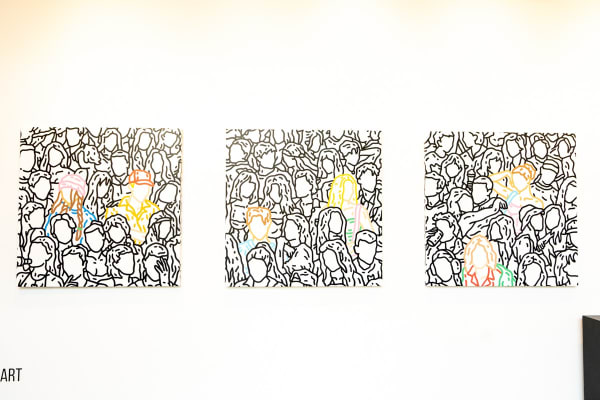 Chance Cooper paintings hanging in Carousel Fine Art's Miami location for Chance Cooper's Spotlight Exhibition, "Between Me and You."