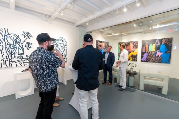 Carousel Fine Art's gallery space in Miami, FL during Chance Cooper's Spotlight Exhibition, "Between Me and You."
