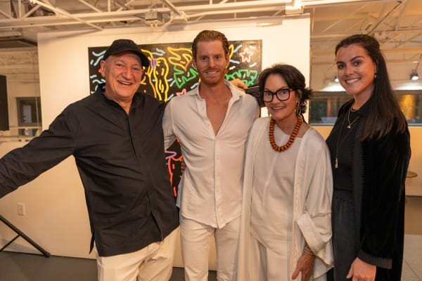 People at Carousel Fine Art's gallery space in Miami, FL during Chance Cooper's Spotlight Exhibition, "Between Me and You."
