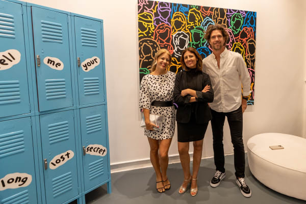 People at Carousel Fine Art's gallery space in Miami, FL during Chance Cooper's Spotlight Exhibition, "Between Me and You."