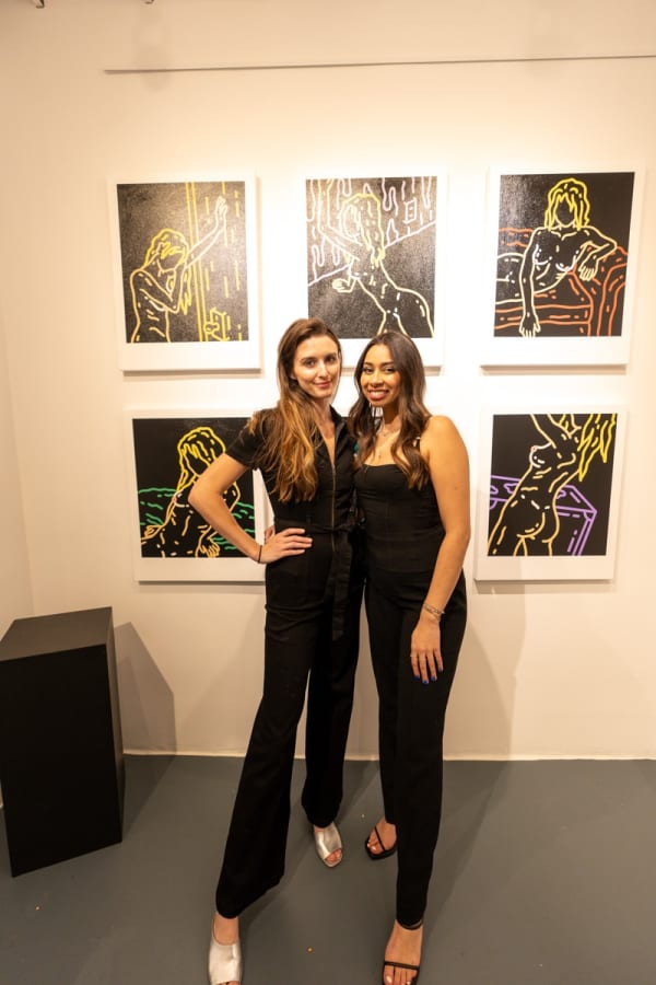 People at Carousel Fine Art's gallery space in Miami, FL during Chance Cooper's Spotlight Exhibition, "Between Me and You."