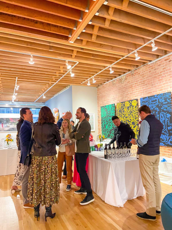 People at the Collector's Dinner at Carousel Fine Art's gallery space in Chicago.