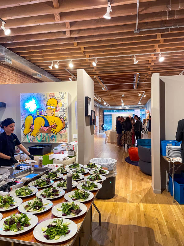Table with food for Collector's Dinner at Carousel Fine Art's gallery space in Chicago.