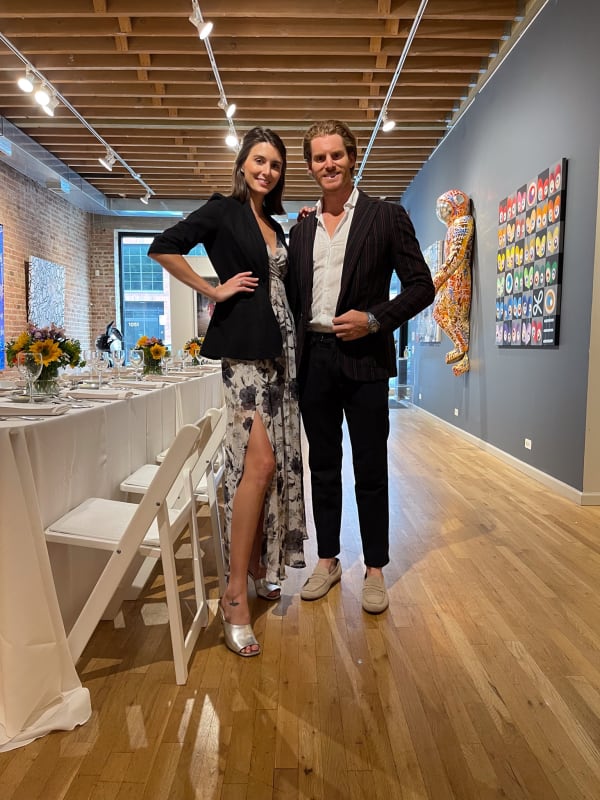 Gallery owners of Carousel Fine Art at Collector's Dinner at Carousel Fine Art's gallery space in Chicago.