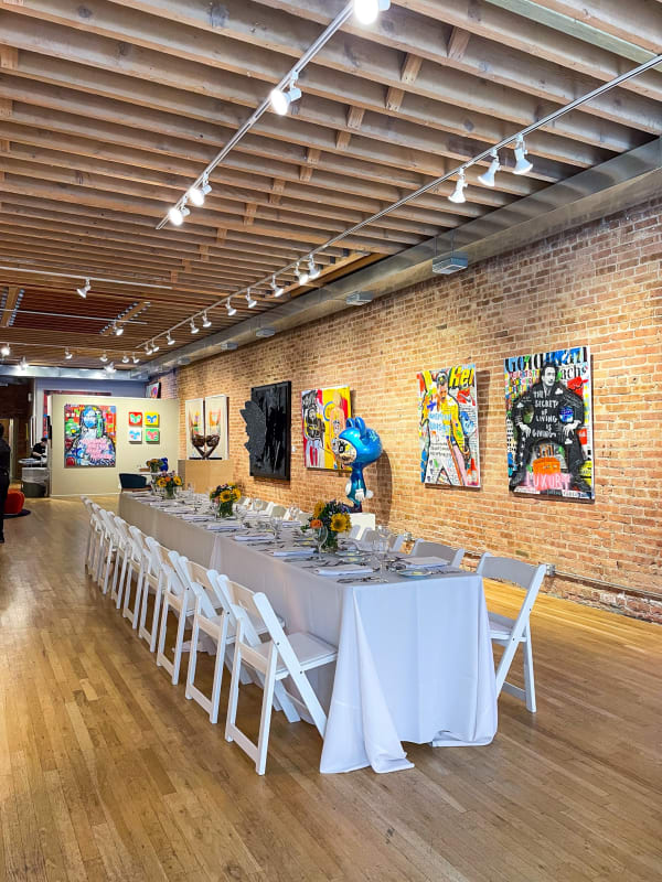 Table decorated for Collector's Dinner at Carousel Fine Art's gallery space in Chicago.