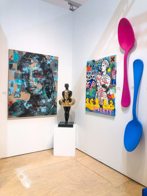 Paintings and sculptures displayed at Carousel Fine Art's gallery both at the Hampton's Art Market, 2021.