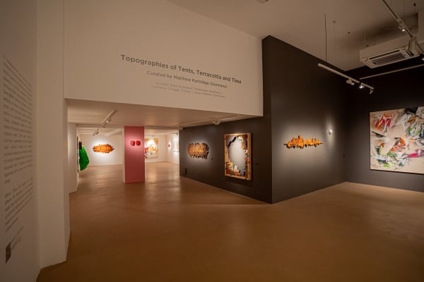 Topographies of Tents, Terracotta, and Time Curated by Matthew Partridge