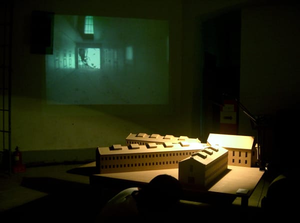 Seodaemun Prison, 2004, A model of Seodaemun Prison made of wood, 4 video cameras, a video projector, 4 motors, 160x140x120cm 서대문형무소, 2004, 나무, 모터, 4대의 소형 비디오카메라, 4개의 모터, 비디오 프로젝터, 160x140x120cm