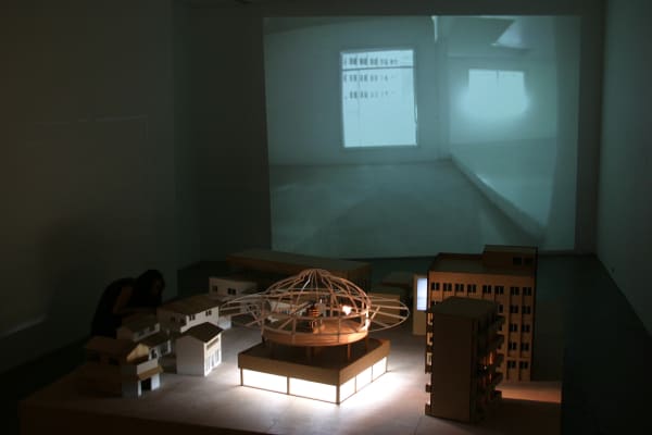 160x120x120cm ​Acryl, wood, 4 video cameras, 2 motors