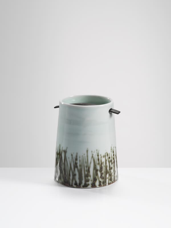 Chris Keenan, 35. Celadon caddy with reddish reeds and (4000-year-old) bog oak fastening