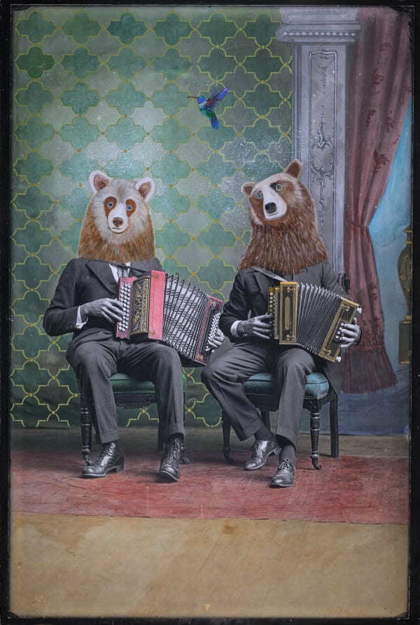 Two brown bears playing accordions in vintage suits.