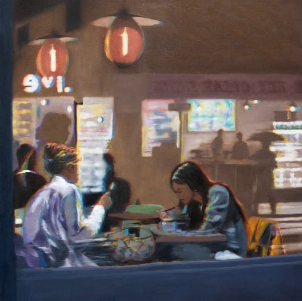Looking through a window into a cafe with people seated and talking