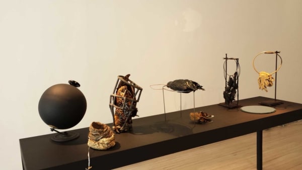 Strange Birds, 2013, created and collected objects on table