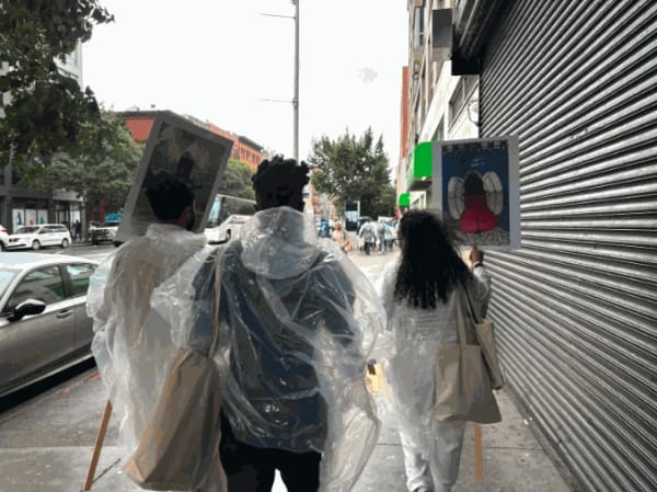 Participants carried signs with illustrations made by artists from around the world.