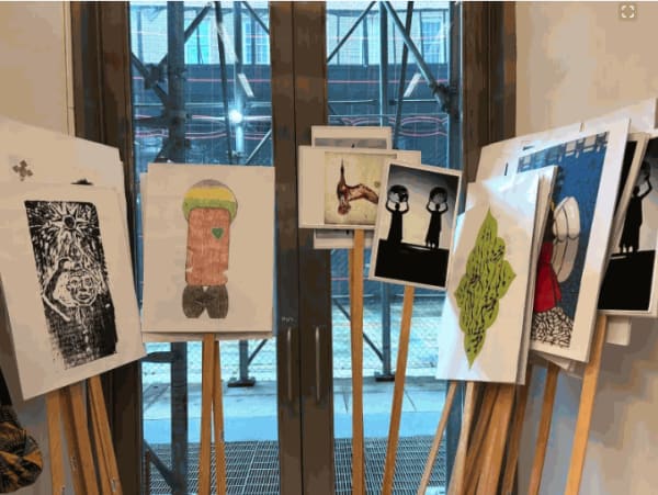 Some of the signs sent by artists for the September 7 procession.