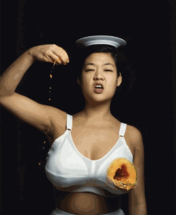 Patty Chang, Melons (At a Loss), 1998, C-Print, 101.6 x 72.6cm. ©️Courtesy the artist