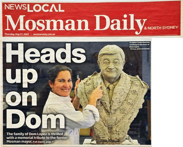 Front page of the "Mosman Daily" newspaper dated Thursday, May 17, 2012, featuring a headline "Heads up on Dom." The image shows sculptor Linda Klarfeld smiling while working on a clay bust of former Mosman Mayor Dom Lopez. The sculpture depicts Lopez wea