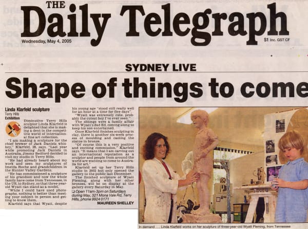 Newspaper article titled "Shape of things to come" from The Daily Telegraph dated May 4, 2005. The feature highlights sculptor Linda Klarfeld working on a life-sized clay sculpture of a three-year-old boy, Wyatt Fleming, from Tennessee. Linda, dressed in