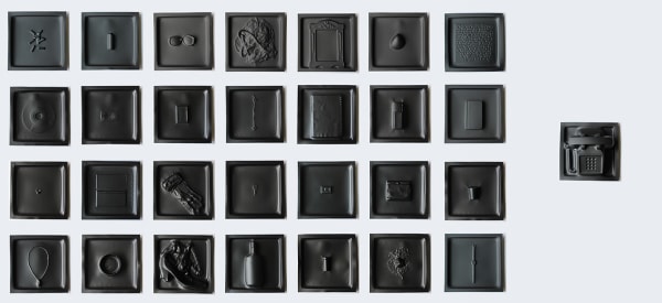 Industrial Poems Vacuum formed black polystyrene 29 panels each 12 x 12 inches Overall dimensions 60 x 84 inches
