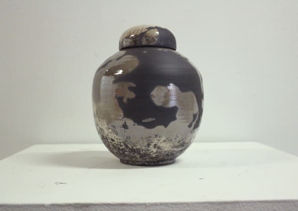 Urn, Susan B. O'Donnell, 2017 Raku fired ceramic with bone fragments 10 25 x 9 inches