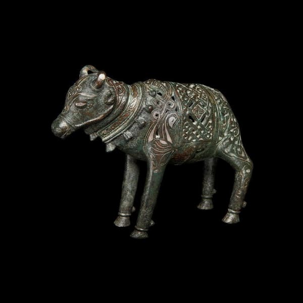 A RARE SILVER INLAID CALF