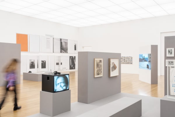 Installation view On the Street, 11 April – 31 August 2025, Kunstmuseum Liechtenstein, Vaduz Front: Tomislav Gotovac, Cleaning of Public Space, 1981 Courtesy Gregor Podnar Vienna Photo: Sandra Maier © Kunstmuseum Liechtenstein, Vaduz