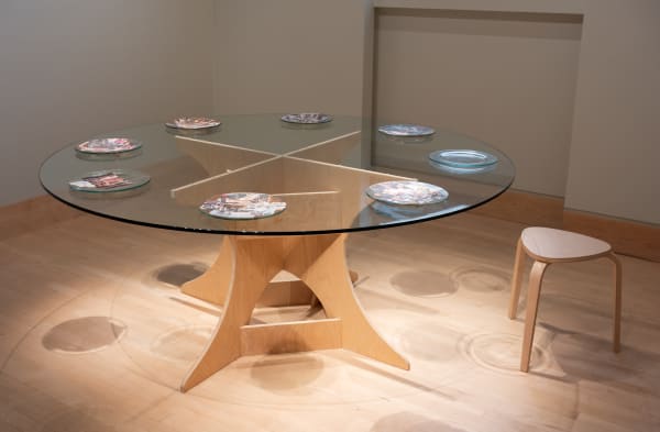 Helen Zughaib Eat the News, 2016-ongoing Glass plates (made by Washington Glass Studio), torn newspaper, and enamel paint