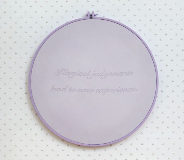 Alex McQuilkin Illogical Judgements, 2023 Birdseye fabric, thread, dye, aluminum, and enamel 24 inch diameter