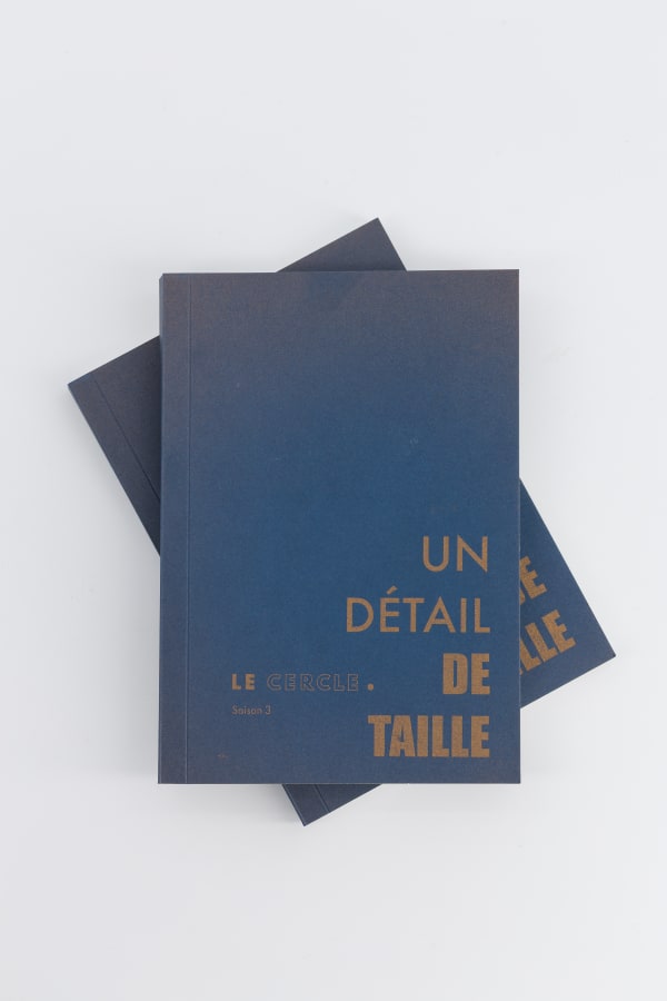 Un Détail de Taille