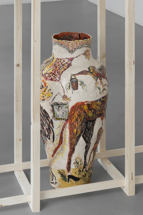 Detail of an installation from Karim Boumjimar’s Mouths, Vessels, Portals (2025), combining chalk drawings on canvas with ceramic forms.