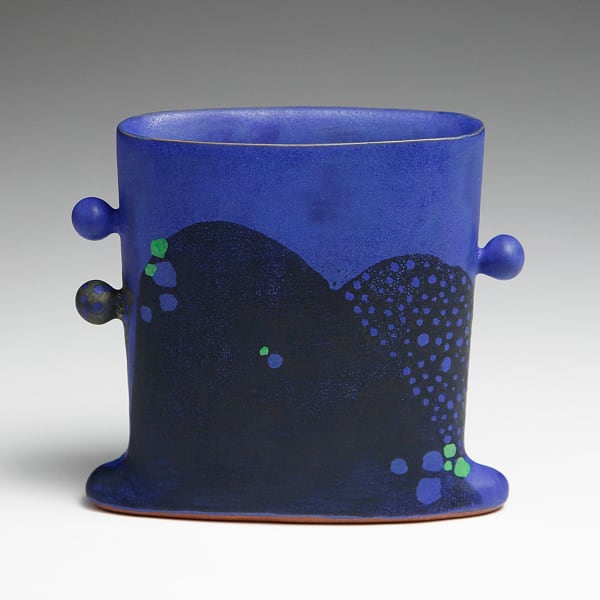 WORK 16-14; Rounded, flattened, square vase with winged base and three spherical ears, decorated with arc patterning in bright blue on black and dotted green patterning 2016 Glazed stoneware 6 1/4 x 7 1/8 x 2 1/2 in. Inv# 9905
