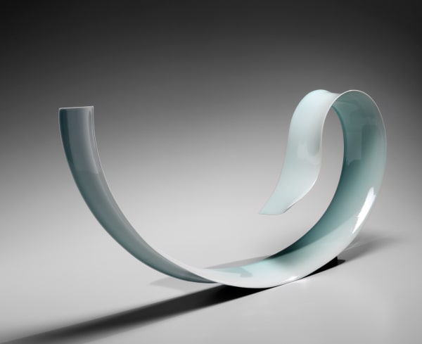 Kino Satoshi (b. 1987) Mountain Gust; Thin, elongated and curling ribbon-like sculpture 2016 Seihakuji (bluish-white) glazed porcelain 12 1/4 x 28 x 3 3/8 in. Inv# 9720 SOLD