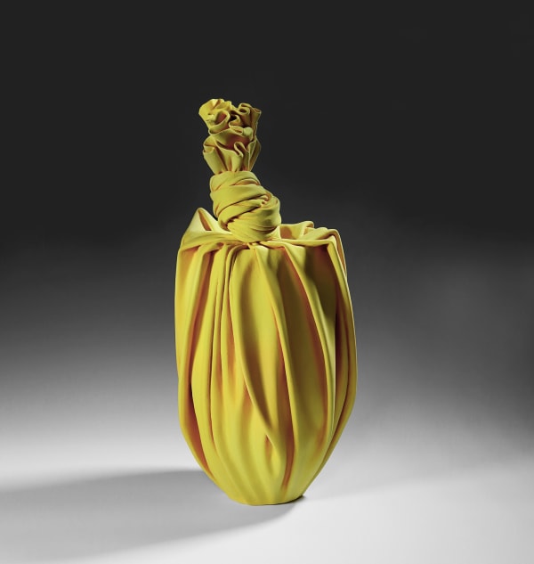 Tanaka Yū (b. 1989) Yellow sculpture in the shape of a knotted furoshiki (wrapping cloth) enclosing a conical vase 2020 Matte-glazed stoneware 20 7/8 x 10 1/4 x 11 in. Inv# 11723 SOLD