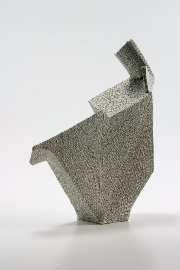 Multi-faceted sculpture with two sides extended over the mouth with colored clay inlays (#2) 2007 Stoneware 13 1/4 x 11 1/4 x 3\" Inv# 5438