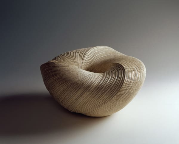 Large, ﬂattened undulating vessel with diagonally incised cascading folds 2007 Stoneware 11 1/4 x 21 x 21 1/4 inches Inv# 5449