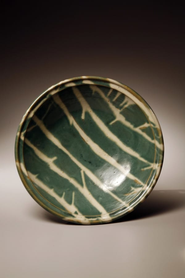 HAMADA SHÔJI Large thickly walled round plate with green glaze and brush strokes of white glaze 1968 Glazed stoneware 9 x 28 inches Inv# 5205
