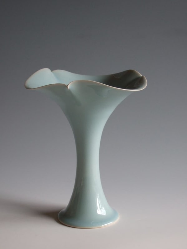 Flaring flower vase in the form of a lily with three pinched points in the rim 2008 Porcelainous stoneware with crackled celadon glaze 10 x 7 3/4\" Inv# 5956