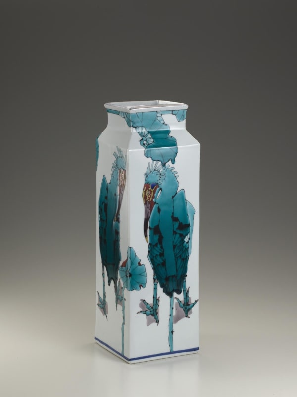 Tall square vase decorated with blue Japanese crested ibises and lotus plants, 2010 Porcelain with polychrome enamel glazes 18 3/4 x 6 inches Inv# 6665 SOLD