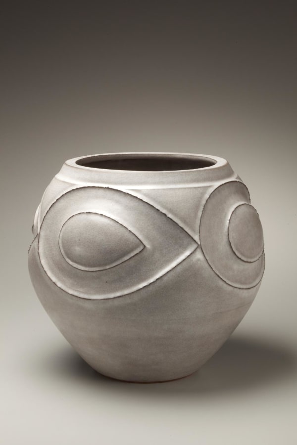 Kusube Yaichi (1897-1984) Circular gray art-deco style sculpted vessel , ca. 1955 Porcelain with opaque matte grayish-white glaze 12 1/2 x 11 x 11 1/2 inches Inv# 6464 SOLD